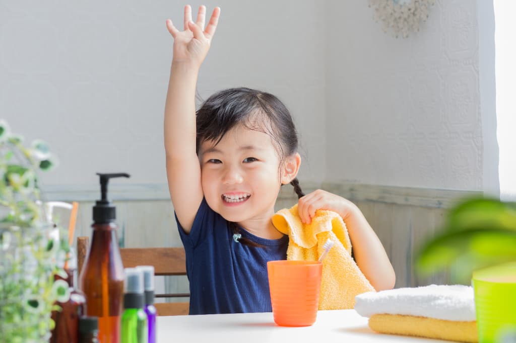 毎日の歯磨きを習慣化できるようになった笑顔の子ども