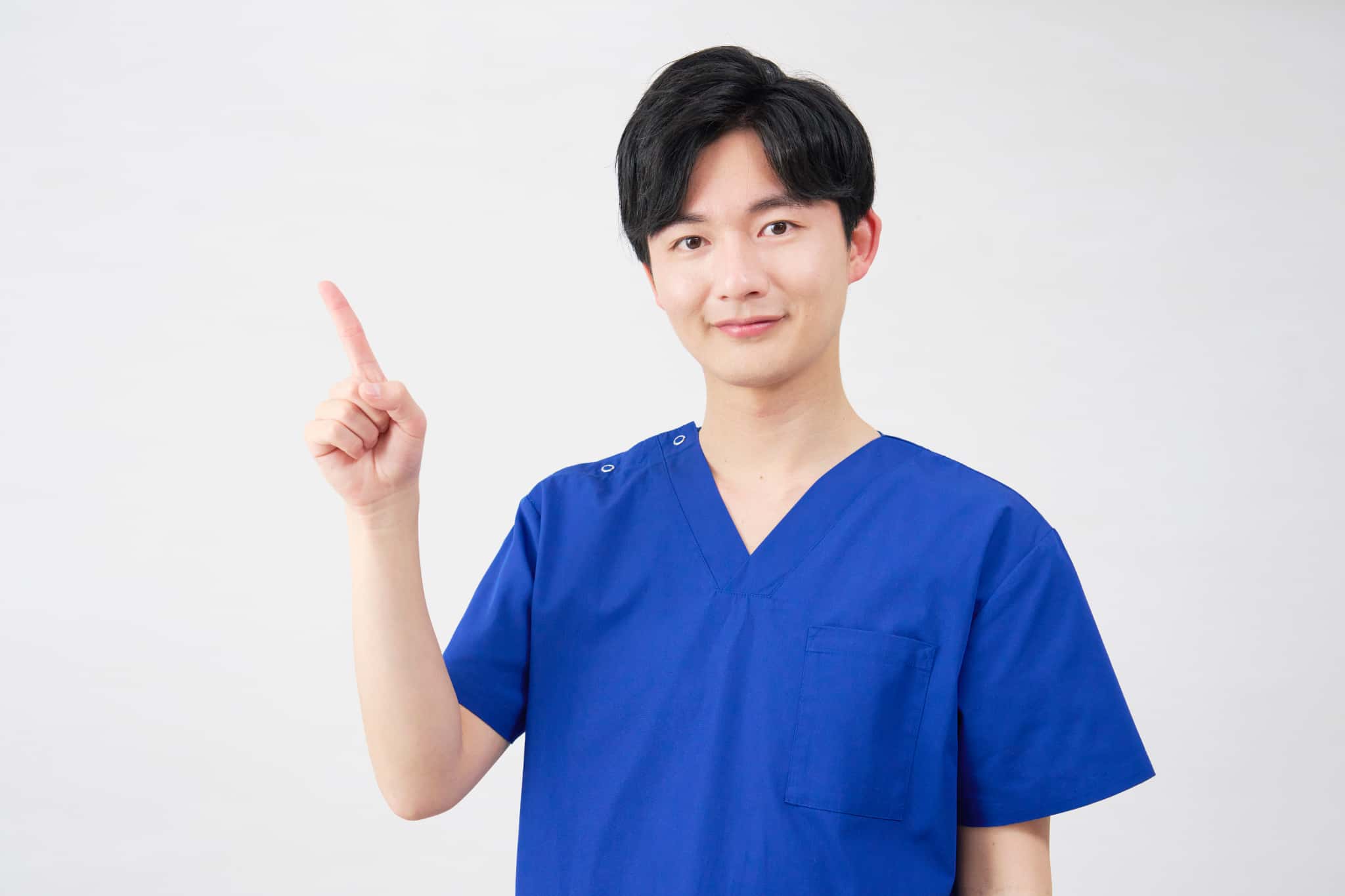 歯肉炎について説明する歯科医